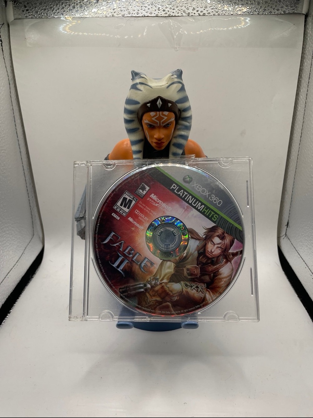 Microsoft Xbox 360 Fable II Game Disc with Blue and White Figure Stand